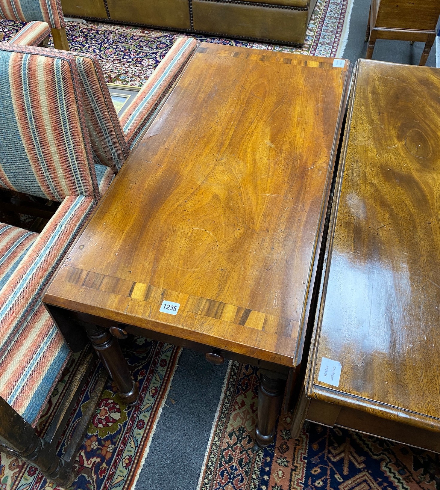 A Victorian coromandel banded mahogany Pembroke table, width 48cm, depth 96cm, height 71cm *Please note the sale commences at 9am.